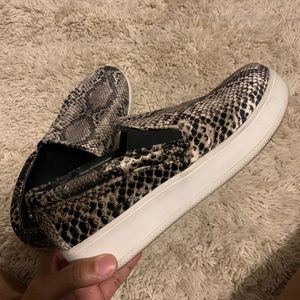 platform snakeskin slip ons